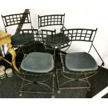 A set of four iron savonarola style chairs, W. 51cm. H. 86cm.