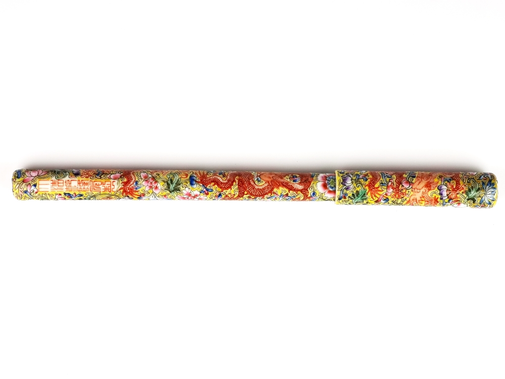 A beautifully hand painted Chinese porcelain writing brush decorated with dragons, L. 23cm.