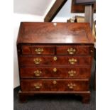 A Georgian mahogany and fiddle back veneered bureau with five drawers, W. 92cm. H. 107cm.