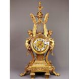 A large early 20th century French gilt brass mantel clock, H. 71cm.