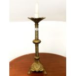 A 19th Century ecclesiastical brass electric candlestick, H. 60cm.