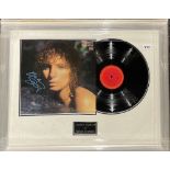 Autograph interest: A framed signed record by Barbra Streisand (American 1942 - present), frame size