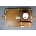 A 1920's oak and brass tea tray together with a 1920's mantel clock.