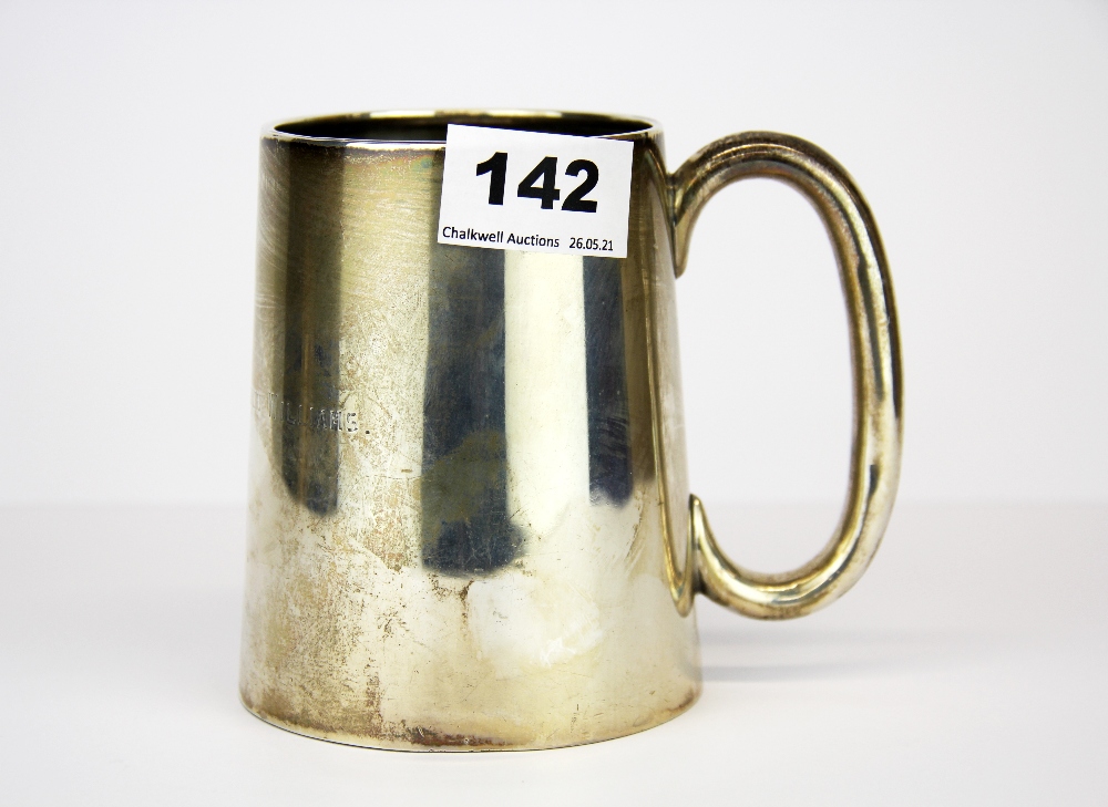 A glass bottomed white metal tankard, tested silver, H. 11cm.