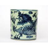 A Chinese hand painted porcelain brush pot, H. 14cm. Dia. 13cm.