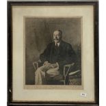 A framed portrait of King George V with engraved signature and pencil signed by the Artist T.