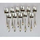 A set of six hallmarked silver coffee spoons together with a further five coffee spoons.