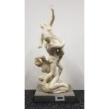 A resin reproduction classical figure on a polished stone base, H. 41cm.