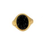 A gentleman's 9ct yellow gold onyx set ring, a/f.