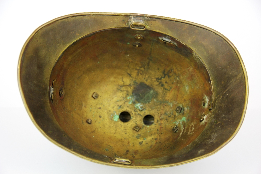 An antique gilt brass fireman's helmet. - Image 4 of 4