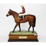 A limited edition Beswick porcelain figure of Red Rum modelled by David Lovegrove, H. 38cm.