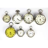 Seven silver pocket watches.