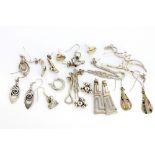 A quantity of silver and other white metal earrings.