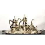 Two silver plated trays and a silver plated tea set.