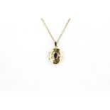 A 9ct yellow gold amethyst set locket pendant and chain, L. 1.8cm.