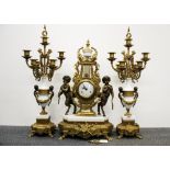 An impressive French porcelain and gilt bronze and brass three piece clock garniture, H. 68cm.