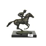 A Lester Piggott commerative bronze figure 'Champion Finish' by David Cornell (with certificate),