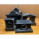 Five slate mantle clock cases.