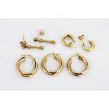 Three pairs of 9ct yellow gold earrings and a further 9ct single hoop earring.