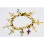 A 9ct yellow gold bracelet with ten 9ct gold cross charms, L. 19cm.