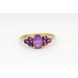 A 9ct yellow gold amethyst set ring, (K.5).