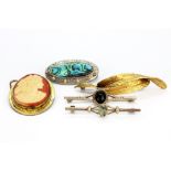 A silver moss agate set brooch, two further silver brooches, a hallmarked silver gilt cameo brooch