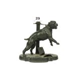 An early 20th Century cold painted white metal figure of a chained bulldog, H. 17cm.