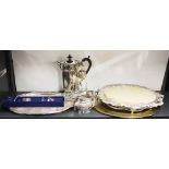 A silver plated framed bread board and other items.