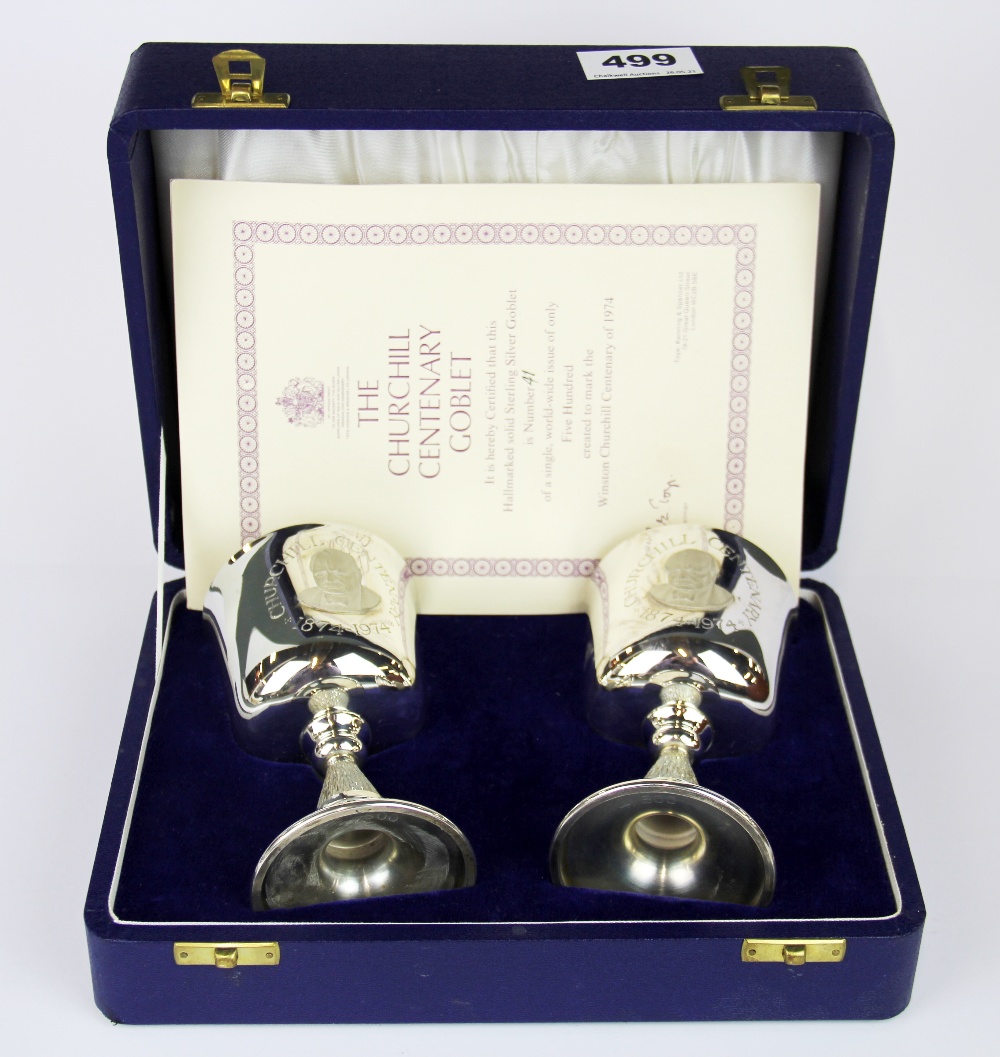 A cased pair of limited edition hallmarked silver 41/500 Churchill centenery goblets.