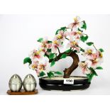 A Chinese porcelain and glass Bonsai tree, H. 28cm, together with a Thai cruet set.