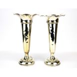 A pair of hallmarked silver vases, H. 22cm.