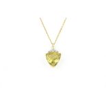 A 9ct yellow gold citrine and diamond set pendant and chain, L. 3cm.