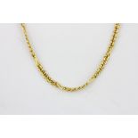 An 18ct yellow gold (worn stamp 750) necklace, L. 44cm.