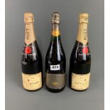 Two bottles of Moet & Chandon champagne together with a bottle of Pelorus 1994.