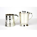 A Georgian hallmarked silver ribbed tankard, H. 6.5cm. together with a continental silver tankard.