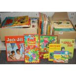 A quantity of vintage annuals and childrens books.