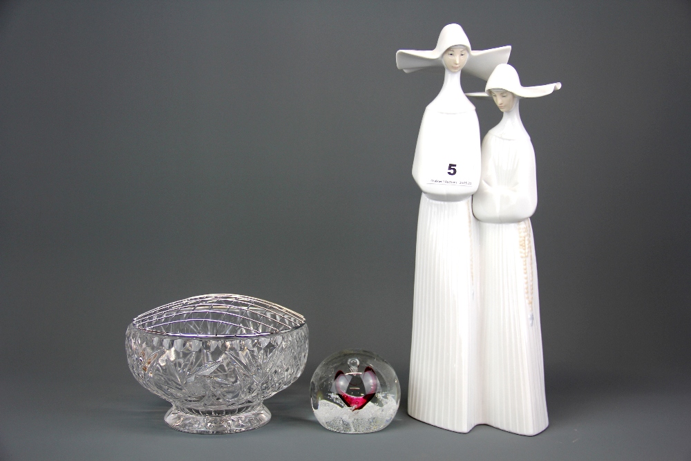 A large Lladro figure of 2 young nuns with box, H.33cm, and a Caithness paperweight together with