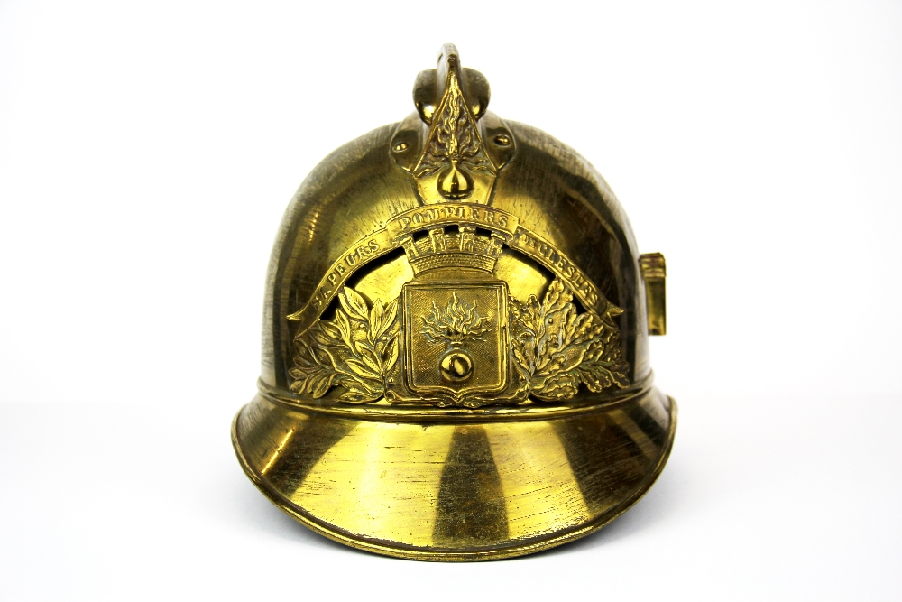 An antique gilt brass fireman's helmet. - Image 3 of 4