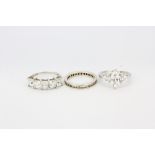 Three 925 silver stone set rings.