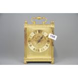 A vintage brass Estyma carriage style mantle clock with quartz movement, H. 22cm. Understood to be