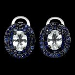 A pair of 925 silver earrings se with oval cut aquamarine and sapphires, L. 1.7cm.