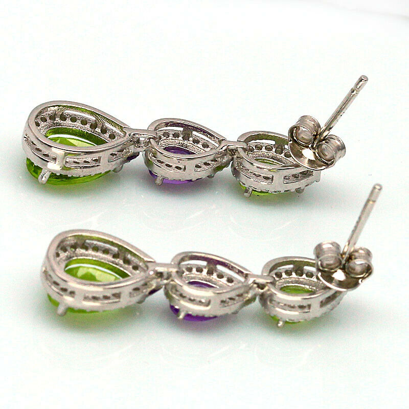 A pair of 925 silver drop earrings set with peridot, amethyst and white stones, L. 3.2cm. - Image 2 of 2