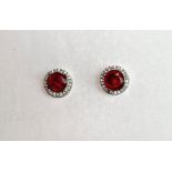 A pair of 925 silver ruby and white stone set cluster earrings, Dia. 1cm.