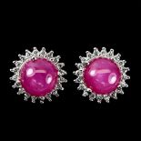 A pair of 925 silver cluster earrings set with cabochon cut rubies and white stones, Dia. 1.1cm.