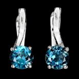 A pair of 925 silver earrings set with swiss cut London blue topaz and white stones, L. 2cm.