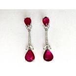 A pair of 925 silver drop earrings set with pear cut rubies and white stones, L. 4.5cm.