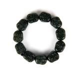 A group of Chinese carved jade/hardstone double sided Buddha head beads, bead size 2cm.