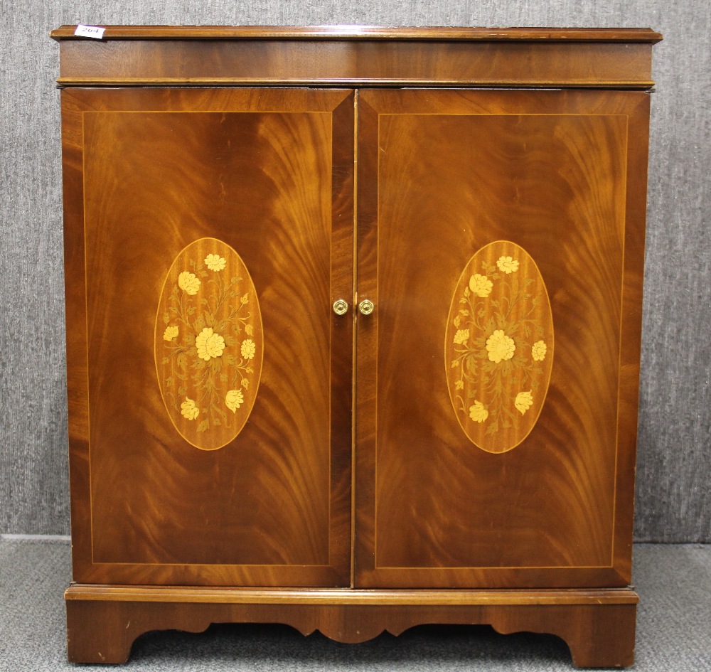 An inlaid mahogany two door cabinet, W. 86 x 52 x 95cm.