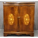 An inlaid mahogany two door cabinet, W. 86 x 52 x 95cm.