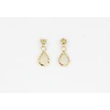 A pair of 9ct yellow gold opal set drop earrings, L. 1.5cm.